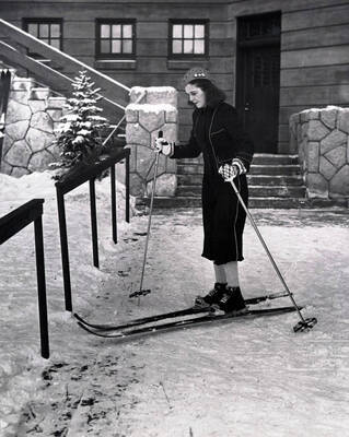 Gloria Baker, glamour New York debutante outside lodge. Sun Valley, Idaho.