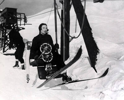 Guest riding lift on Proctor Mountain.