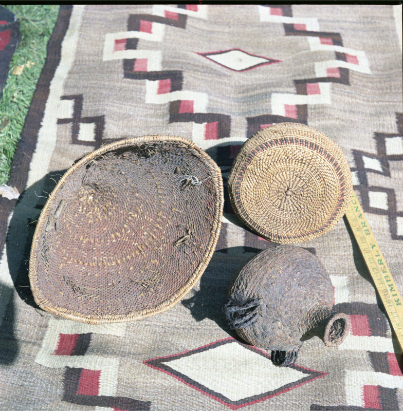 Color photographs of various hand crafted artifacts, including but not limited to baskets, jackets, bags, and other pots.