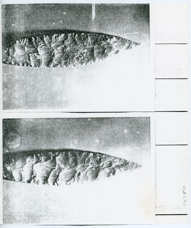 Series of photos showing the same biface from different angles. Includes and envelope with handwritten math on the back.