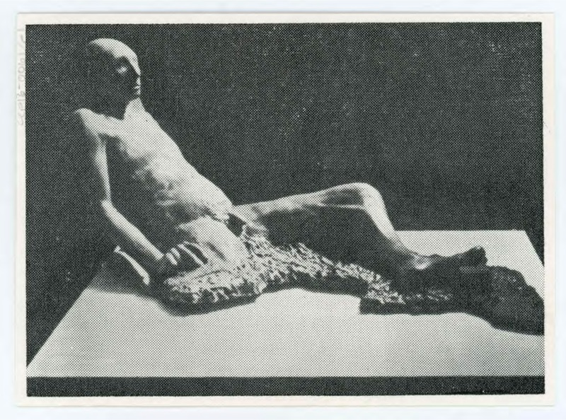 Photograph from Jeffrey Havill to Don Crabtree. The photo depicts a sculpture of a nude man sitting down. The back of the photo is labelled "Jeff B. Havill, Department of Art-Design, Alma College." Envelope included.