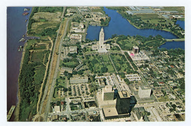 Handwritten postcard from Ruthann Knudson sent to Donald Crabtree from Louisiana's Capital. Front: color photo of the Louisiana Capitol. Back: Handwritten note updating Crabtree on her work in Louisiana.