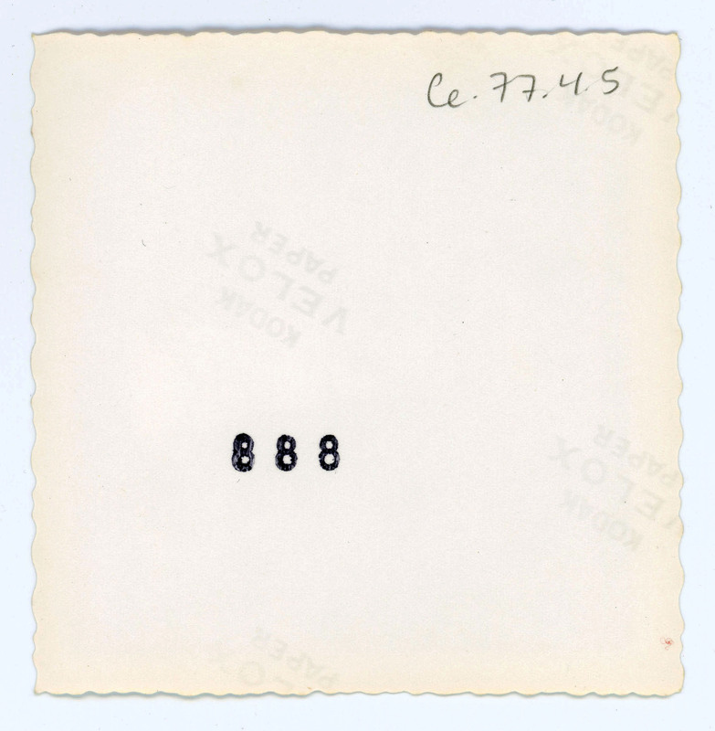 The back of a printed picture labelled "888".