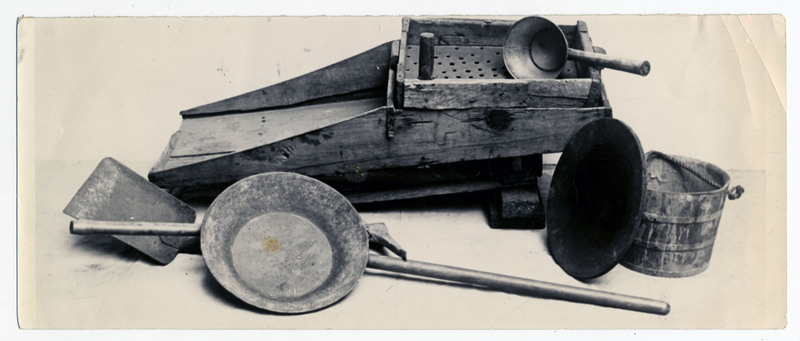 An assortment of gold-panning equipment.