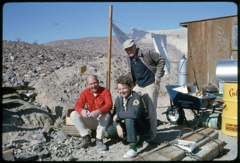 A photographic slide of Donald "Don" E. Crabtree and two others at a lithic sourcing site.