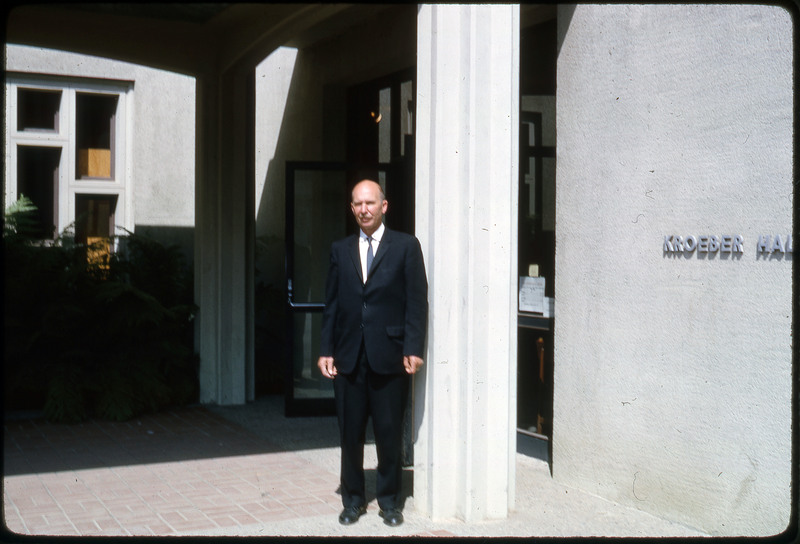 A photographic slide of Don E. Crabtree standing in front of Kroeber Hall.