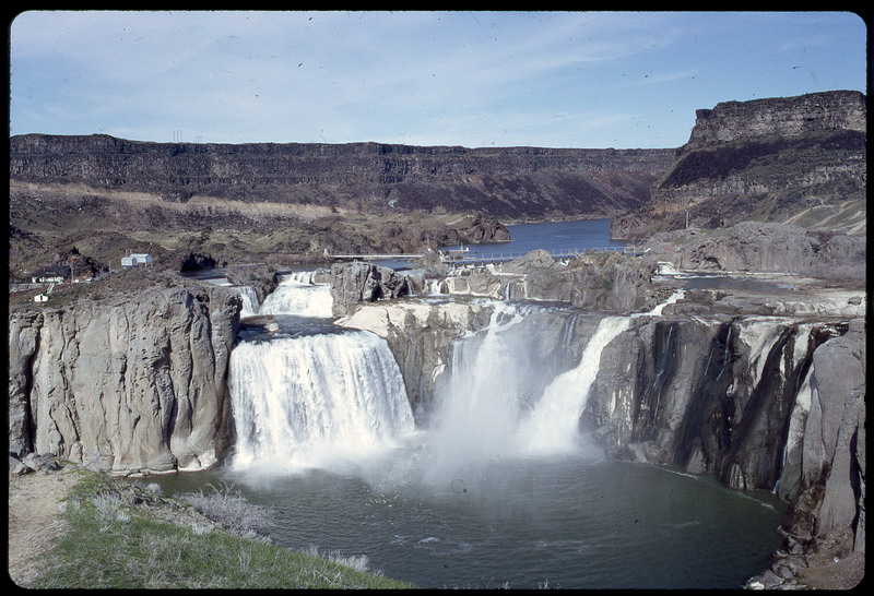 A photographic slide of a scenic view of a series of waterfalls.