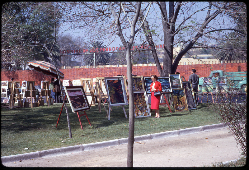 A photographic slide of an outdoor art gallery.