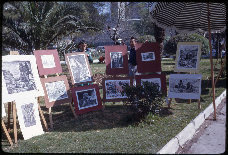 A photographic slide of an outdoor art gallery.