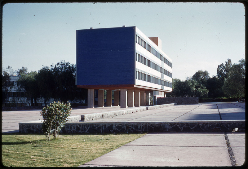 A photographic slide of a large building with geometric architecture.