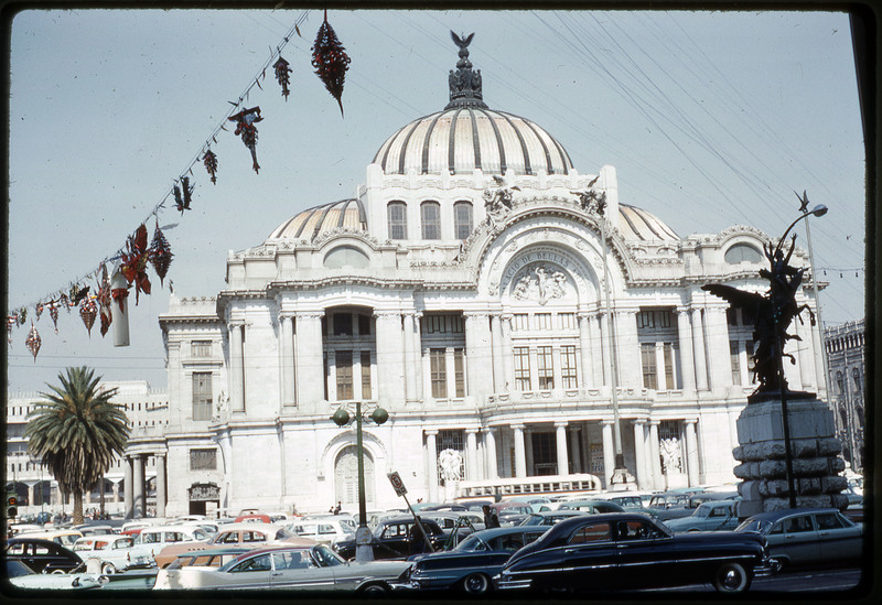 A photographic slide of a front view of the Palacio De Bellas Artes.