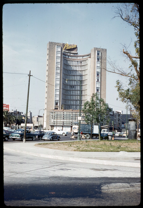 A photographic slide of the front of the Paz en la Tierre Plaza.