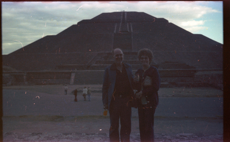 A photograph of Donald and Evelyn Crabtree posing in front of the Pyramid of the Sun in Teotihuacan.