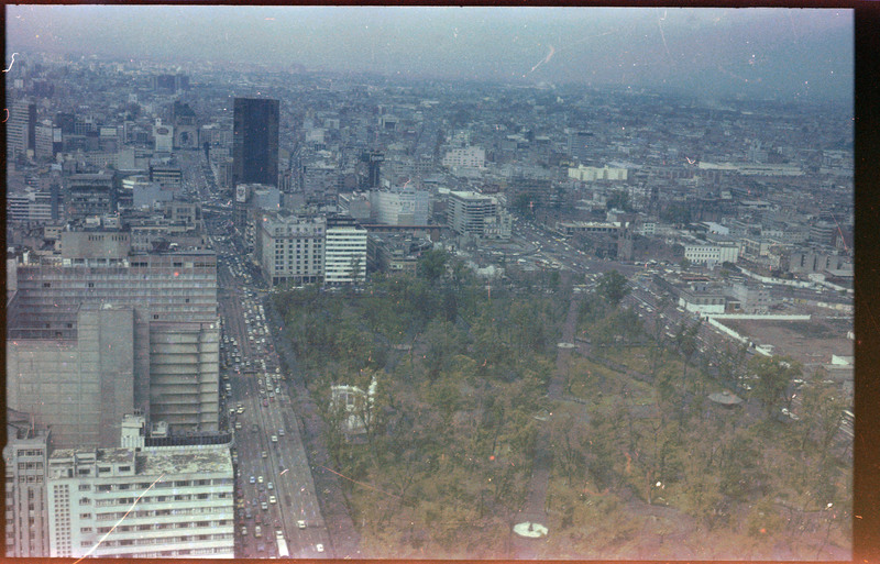 A photograph showing an aerial view of a city landscape.