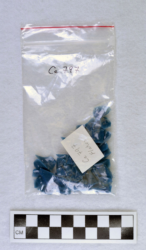 Pressure, #2 in sequence These are from the initial pressure flaking series on the margin of a slab of glass - removed in an alternate/opposite motion producing cone sections. (JW)