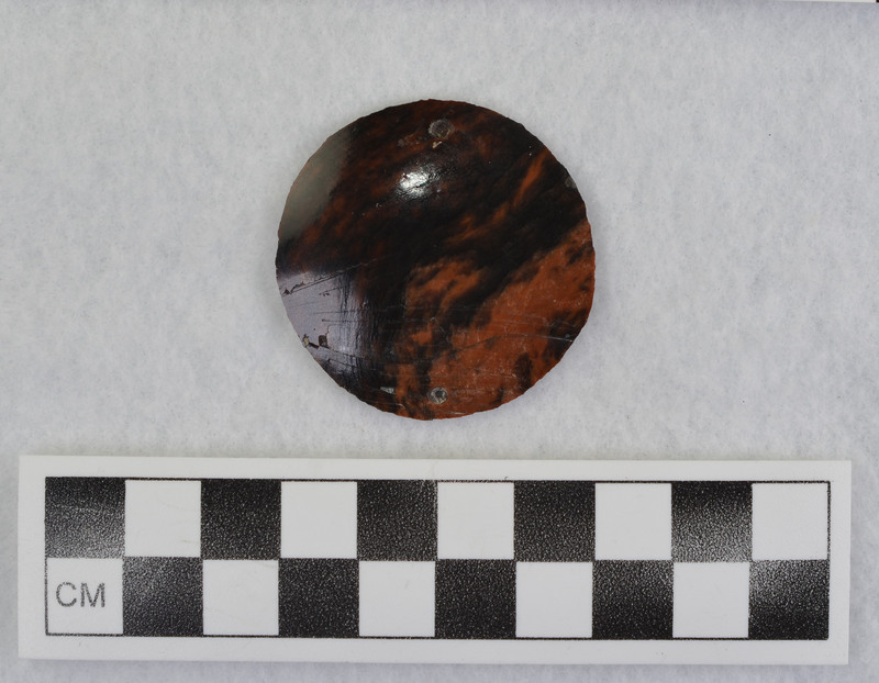 Eraillure flake w/drill and punch perforation