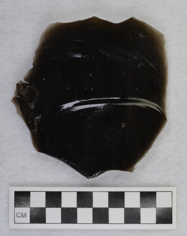 This is an uncommonly large erraillure flake produced by Donald E. Crabtree. For further information see Crabtree, 1972, pg. 31.