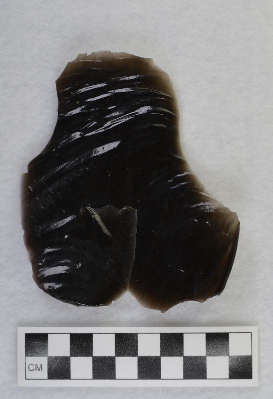 This is an uncommonly large erraillure flake produced by Donald E. Crabtree. For further information see Crabtree, 1972, pg. 31.