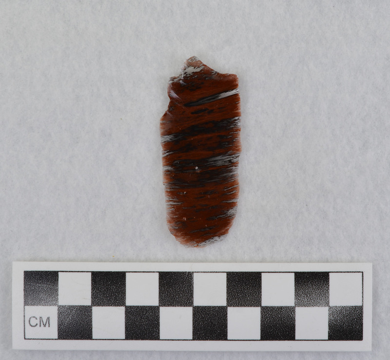 This is an uncommonly large erraillure flake produced by Donald E. Crabtree. For further information see Crabtree, 1972, pg. 31.