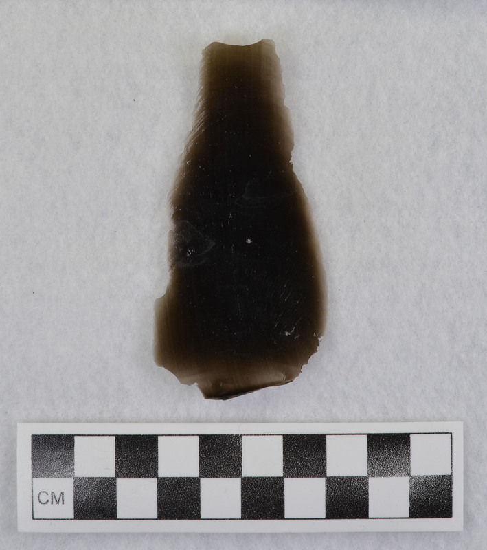 This is an uncommonly large erraillure flake produced by Donald E. Crabtree. For further information see Crabtree, 1972, pg. 31.