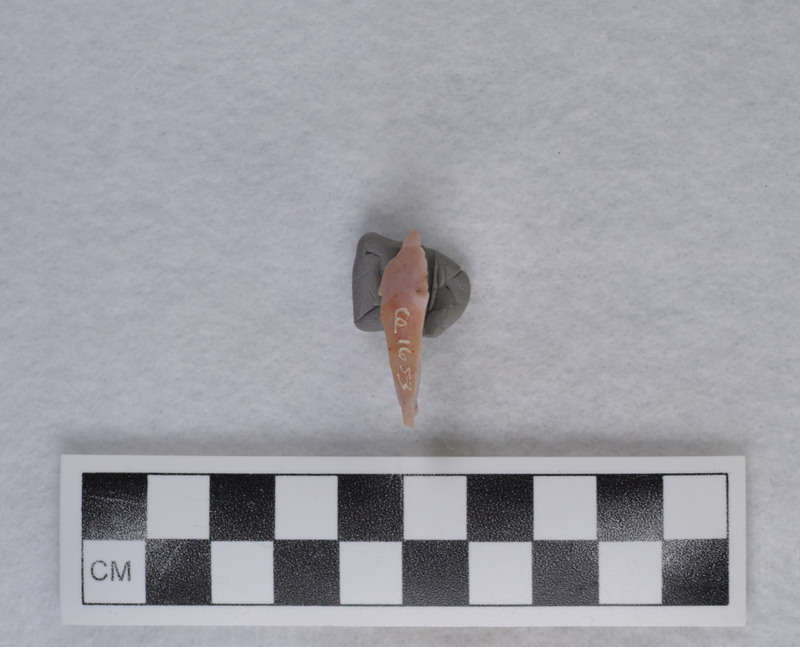 This Battle Mountain chalcedony item exhibits a heat-treating error as indicated by crazing and potlids. This item is associated with Ce.1617-1656.