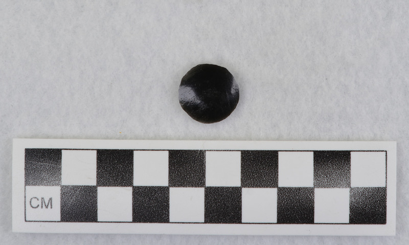 Glass Butte obsidian item produced during a Donald E. Crabtree experiment to manufacture an "eye" as used in Mesoamerican statues.