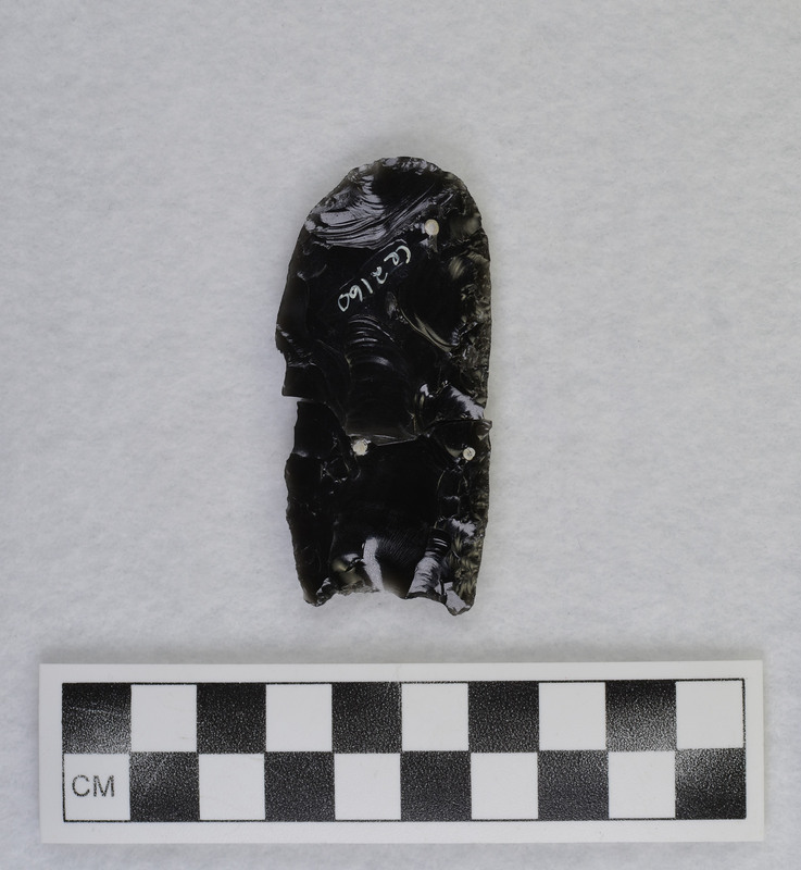 Fluted, broken during fluting process 5/9/69. Preform made by direct percussion on large flake. Flutes - indirect percussion punch technique held between feet. (JW)