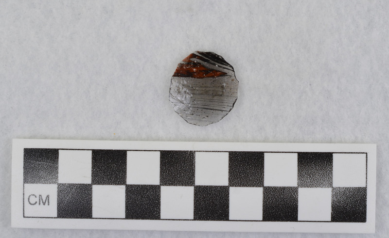 Eraillure, retouched, assoc. w/Ce.10103 Things similar to this were used in Mesoamerica and inlaid in figurines as eyes. (GT)