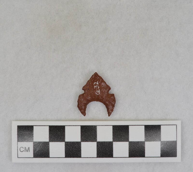 Or exaggerated side notched point w/indented base