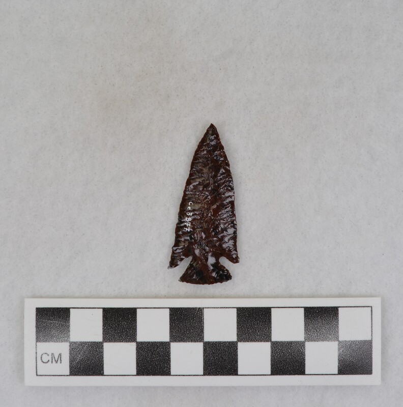 Corner notched with very fine diagonal flaking