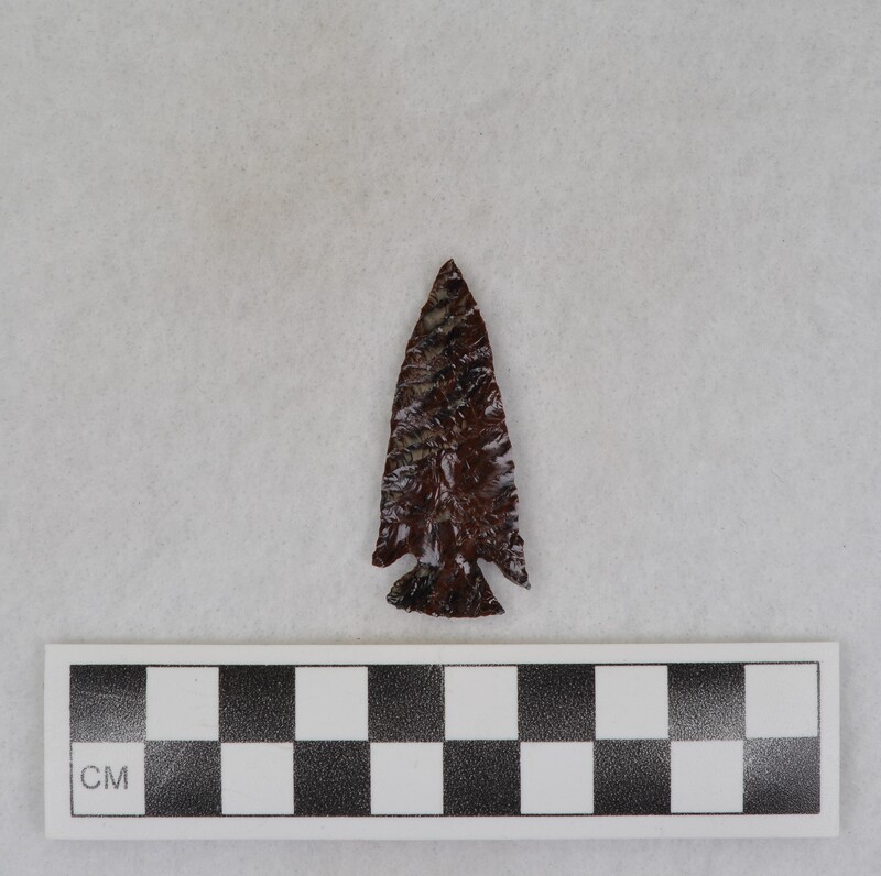 Corner notched with very fine diagonal flaking