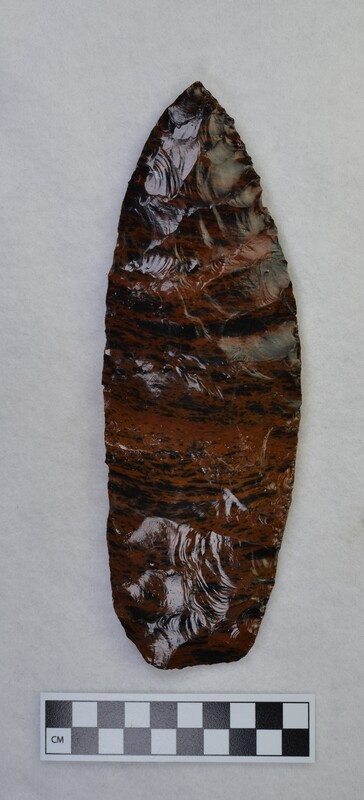 Large, obsidian biface created by Donald E. Crabtree using a percussion method.