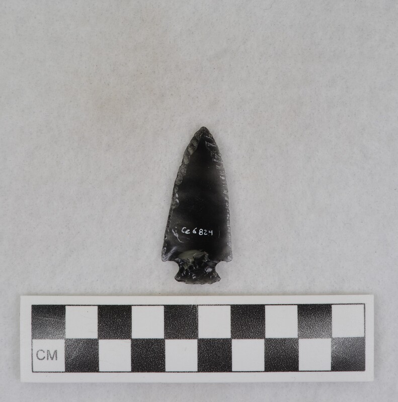 Corner notched, made from a prismatic blade