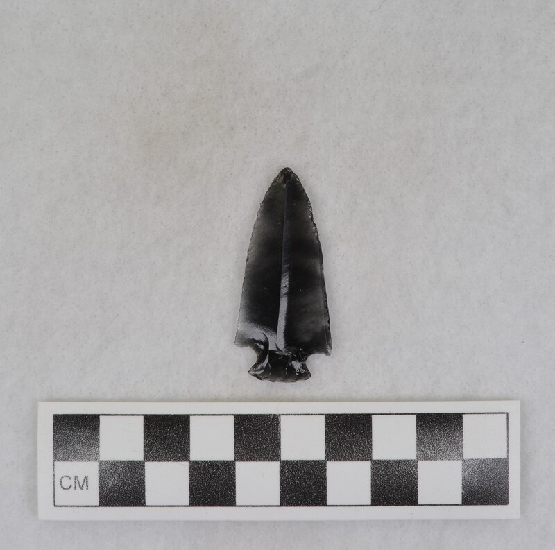 Corner notched, made from a prismatic blade