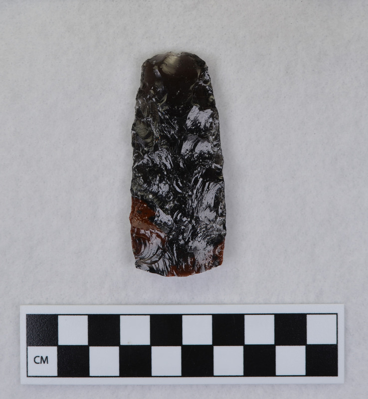 Channel flaking, percussion anvil supported. Percussion anvil supported. From junk pile in backyard. (JW)Mends w/ Ce.1923.