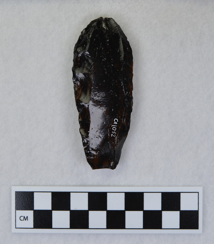 A Clovis point created by Donald E. Crabtree made during his Clovis fluting experiments. The channel flake from this object is Ce.1033.