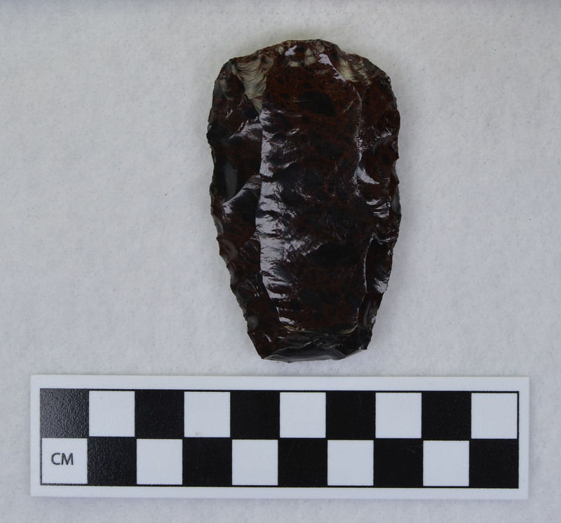 Channel flake removed, mends w/Ce.1036, Distal end ground and supported on anvil. (JW)