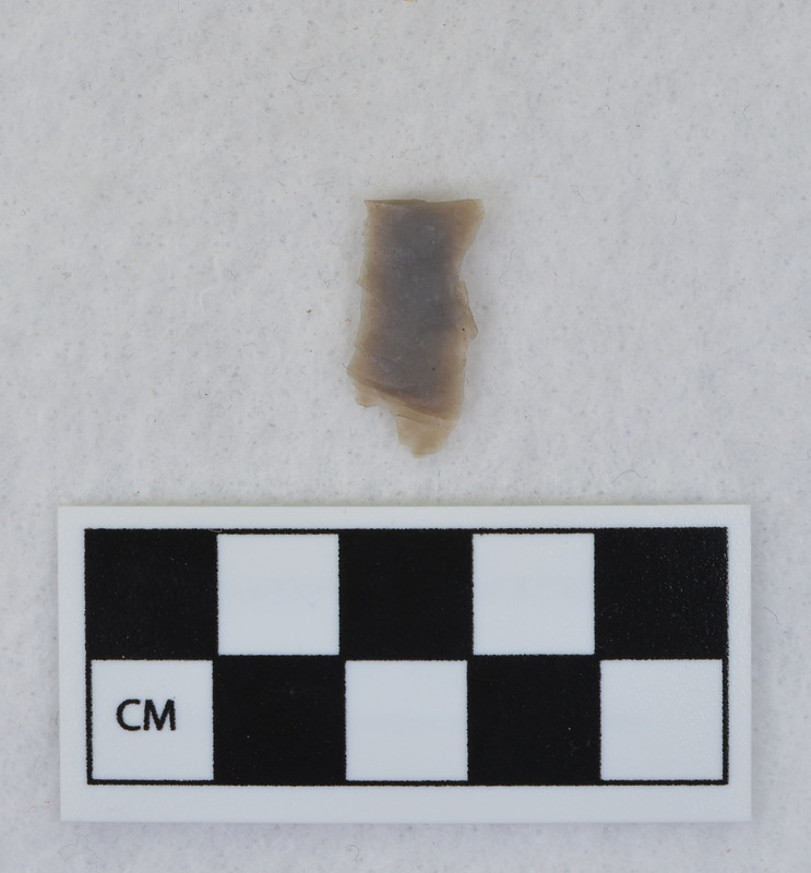 Channel flake fragment, mends w/Ce.1038