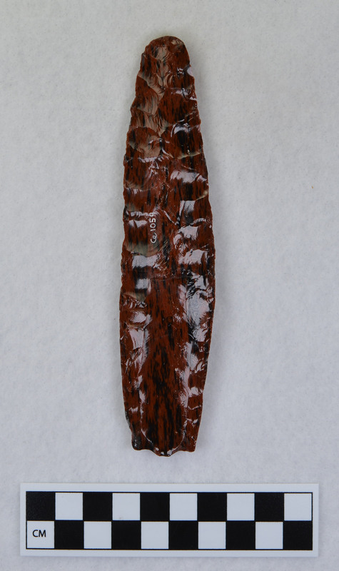 Donald E. Crabtree created this Clovis point. The fluting process resulted in a broken channel flake. The channel flake fragements are Ce.1060 - Ce.1063 and all associated objects can be refit.