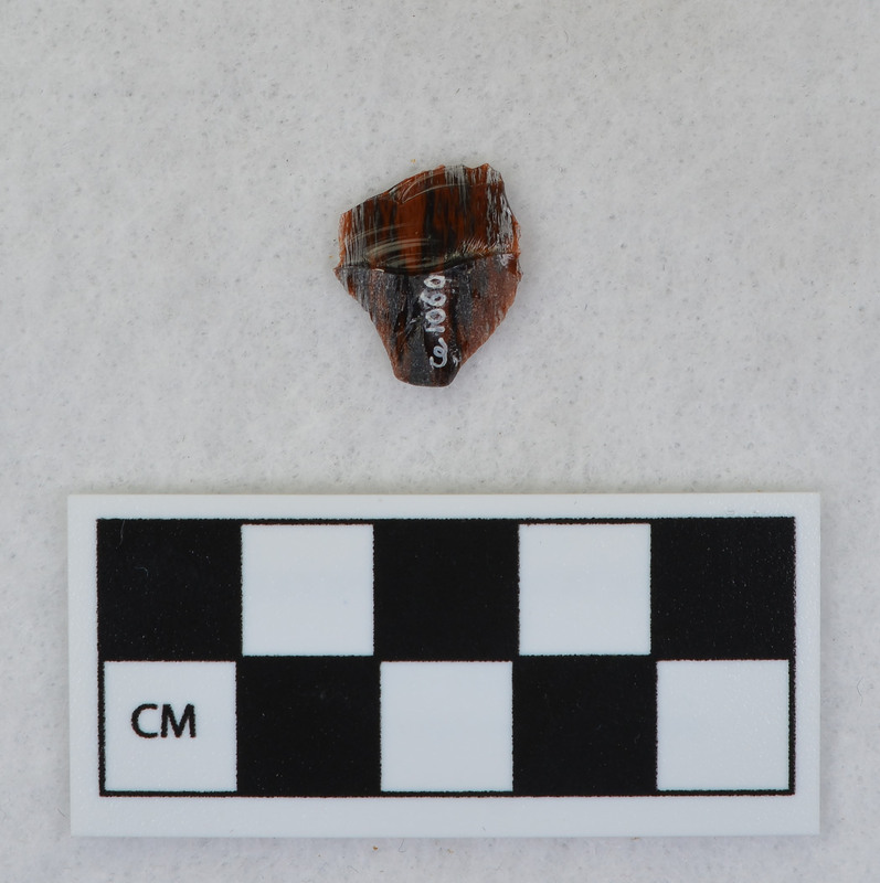 Donald E. Crabtree created this flake by removing a channel flake from the Clovis point he created, Ce.1059. The channel flake is broken and is in three fragments: Ce.1061, Ce.1062 and Ce.1063.