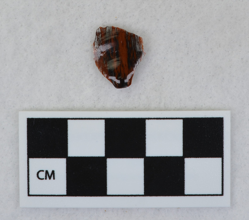 Donald E. Crabtree created this flake by removing a channel flake from the Clovis point he created, Ce.1059. The channel flake is broken and is in three fragments: Ce.1061, Ce.1062 and Ce.1063.