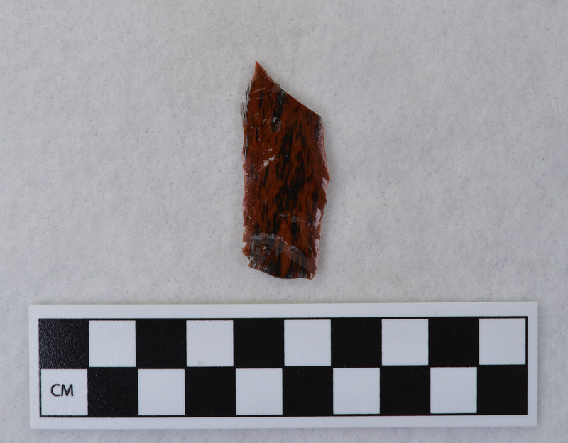 Donald E. Crabtree created this flake by removing a channel flake from the Clovis point he created, Ce.1059. The channel flake is broken and is in three fragments: Ce.1060, Ce.1062 and Ce.1063.