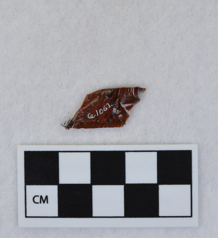 Donald E. Crabtree created this flake by removing a channel flake from the Clovis point he created, Ce.1059. The channel flake is broken and is in three fragments: Ce.1060, Ce.1061 and Ce.1063.