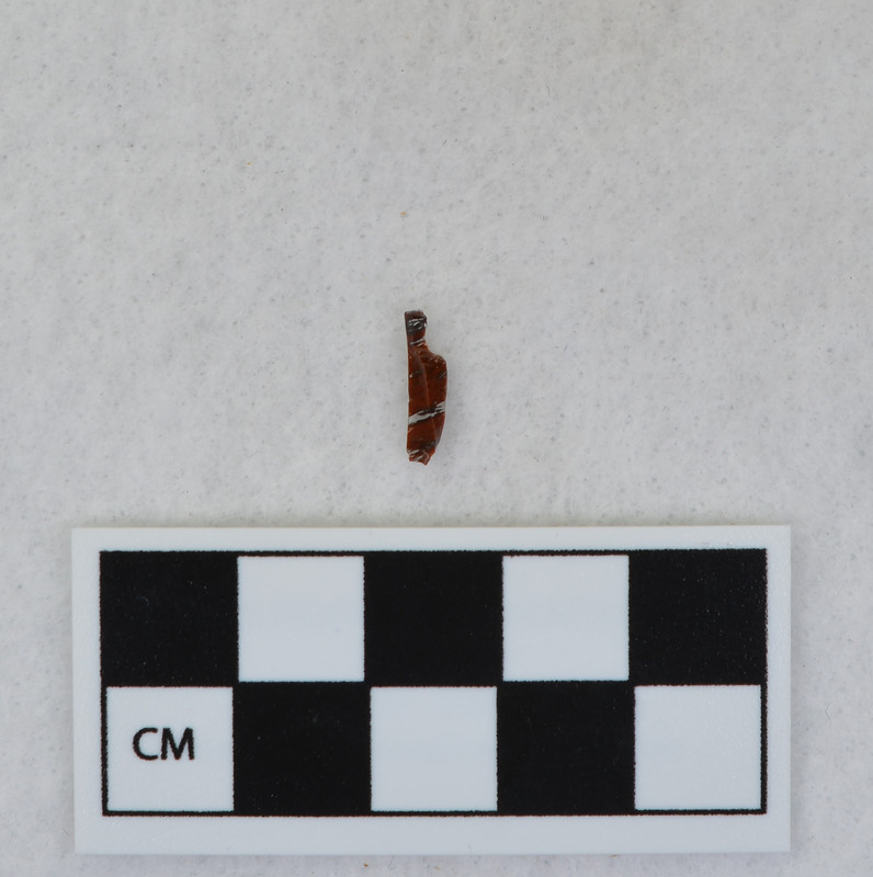 Donald E. Crabtree created this flake by removing a channel flake from the Clovis point he created, Ce.1059. The channel flake is broken and is in three fragments: Ce.1060, Ce.1061 and Ce.1062.