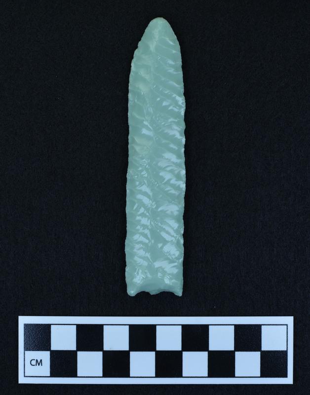 This lanceolate style point made by Donald E. Crabtree was prepared for channel flake removal, but no flake was removed. Platform has not been ground. (JW)