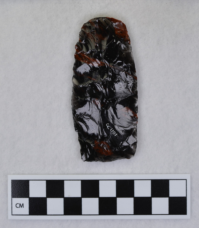 This item was created by Donald E. Crabtree during his fluting experiments. The fragmented channel flakes from this experiment are Ce.1102 - Ce.1104. This item was fluted using rock anvil to support tip and hammerstone was used to remove channel flake. Gene Titmus noted that the distal end ground and the platform were ground.