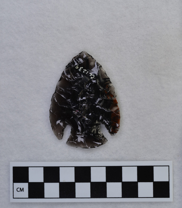 Corner notched, random pressure flaked