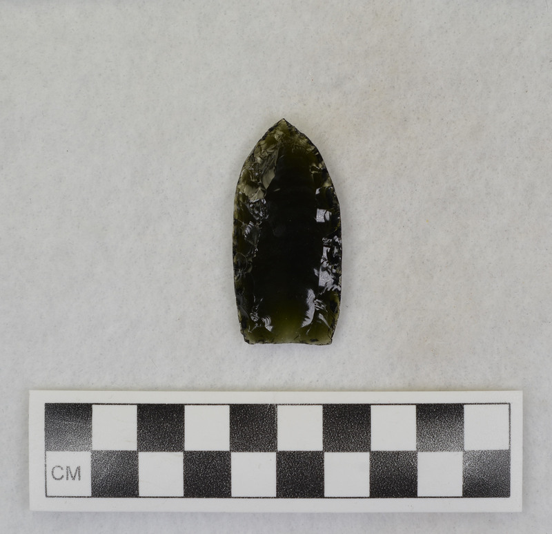 Fluted, lightly ground channel flake platform, Associated channel flakes renumbered as Ce.10122, Ce.10123.