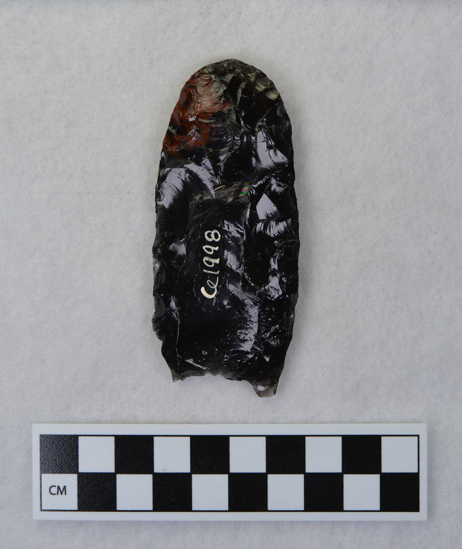 This was made by Donald E. Crabtree as part of his fluting experiments. The object is a fluted preform with the distal end ground to allow for anvil support. (JW)