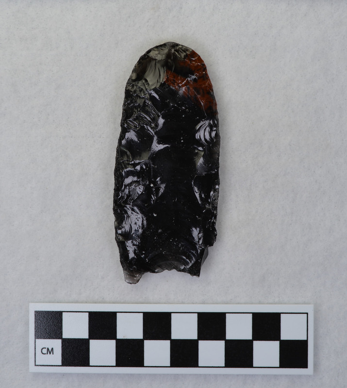 This was made by Donald E. Crabtree as part of his fluting experiments. The object is a fluted preform with the distal end ground to allow for anvil support. (JW)